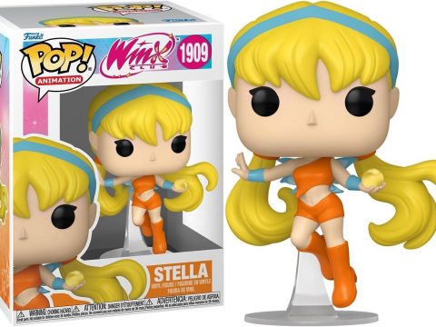 Stella se démarque par son look éclatant et chaleureux. Sa tenue orange vif - bottes, jupe et haut assortis - est complétée par une longue chevelure dorée, formant un ensemble lumineux.