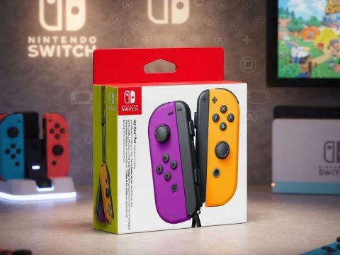 Paire Joy-Con Gauche Violet / Droite Orange — Accessoire officiel Nintendo. Look unique, multijoueur, capture d'écran, lecture amiibo.